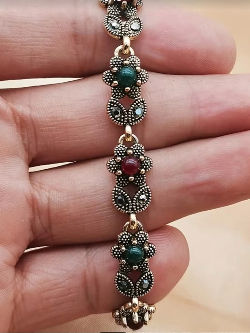 Vintage-Style Rose Gold Bracelet with Red and Green Beads